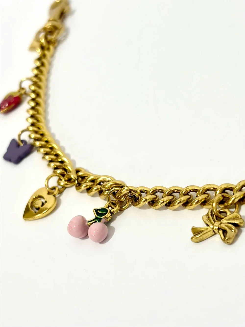 Charming Gold-Tone Swag Bag Chain with Pink Cherry and Multicolor Charms